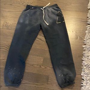 Soulcycle sweatpants with gold triangle and skull